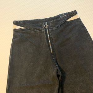 Acid wash black high waisted cut out jeans